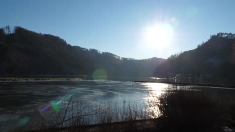 Walking-along-the-frozen-danube-river-in-upper-austria