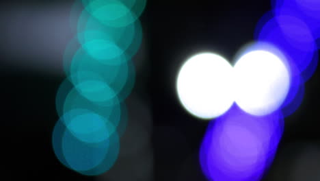 Colourful-carnival-lights-changing-in-and-out-of-focus