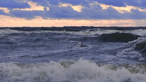 Waves-at-sea-during-a-thunderstorm-at-sunset
