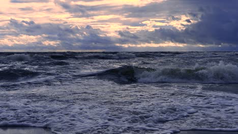 Waves-at-sea-during-a-thunderstorm-at-sunset