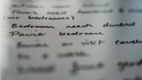 Closeup-of-to-do-list-written-on-white-board-with-black-marker