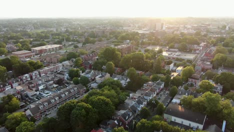 High-aerial-establishing-shot-of-Lancaster-City,-Pennsylvania-PA-USA-during-summer-sunset