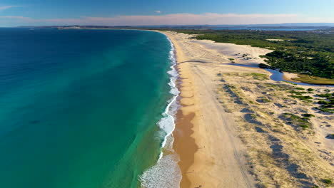 Rising-drone-shot-of-Redhead-Beach-Australia