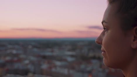 Profile-of-Young-Woman-at-Viewpoint-Watching-Twilight-Above-European-City,-Slow-Motion