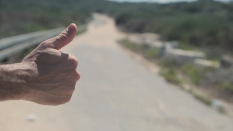 Closeup-of-hand-Hitchhiking
