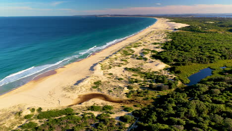 slow-rotating-drone-shot-Redhead-Beach-Australia