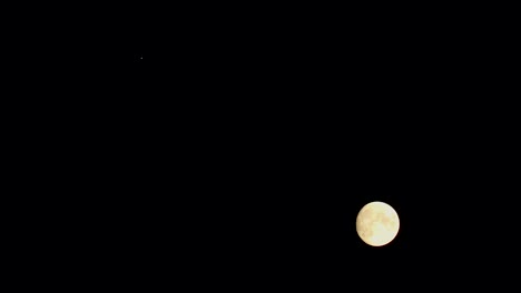 Moon-and-Jupiter-conjunction-as-seen-with-binoculars-on-2020