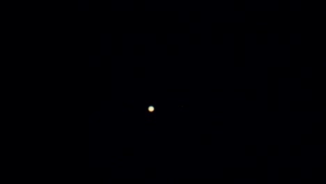 Jupiter-as-seen-in-backyard-telescope-large-magnification-with-four-Galilean-moons