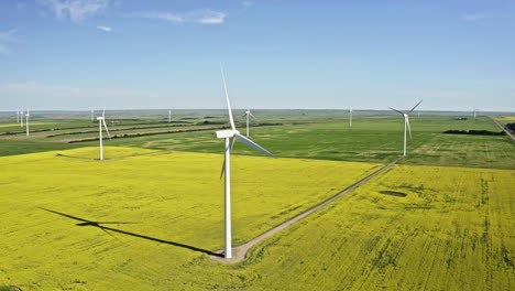 Right-to-left-aerial-panning-shot-of-wind-turbines