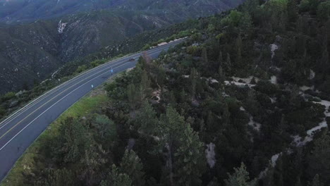 Scenic-mountain-road-through-California-mountains,-aerial-view