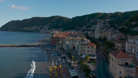 drone-shot-of-the-city-of-Laigueglia,-Liguria-during-sunset