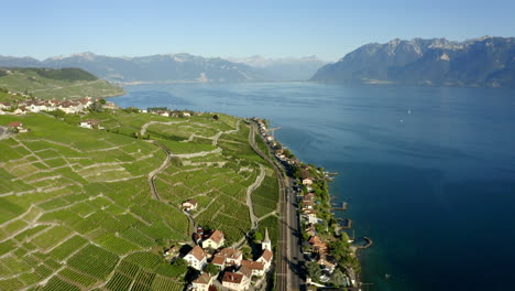 Overflying-The-Village-Of-Villette-in-Lavaux-Vineyard-Terraces,-On-The-Shores-Of-Lake-Leman,-Switzerland---aerial-drone-shot