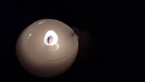 Candle-Flickers-Then-Blows-Out-In-Darkness-Close-Up