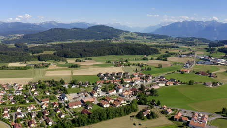 Small-And-Simple-Village-Of-Forel-In-Swiss-Countryside-Switzerland---aerial-shot