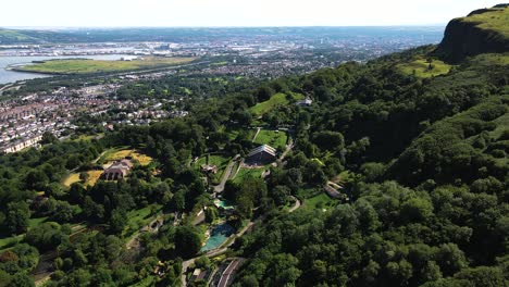 Tilting-aerial-view-of-Belfast-Zoo-with-city-backdrop