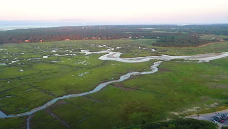 Cape-Cod-Bay-Aerial-Drone-Footage-of-Marsh-Tall-Green-Grass-and-Water-Creeks-at-Golden-Hour