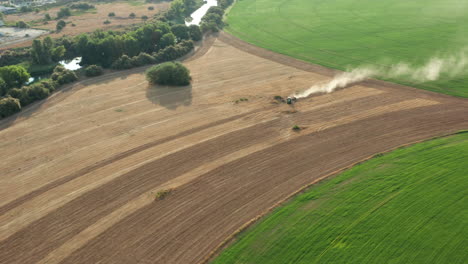 Madrid,-Spain---Tractor-Ploughing-Agricultural-Farmland,-Aerial-Panorama-View