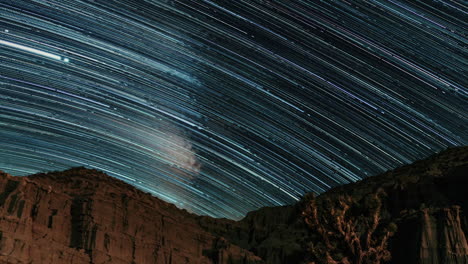 Star-trails-create-a-glowing-rain-shower-above-Red-Rock-Canyon-State-Park---wide-to-zooming-view