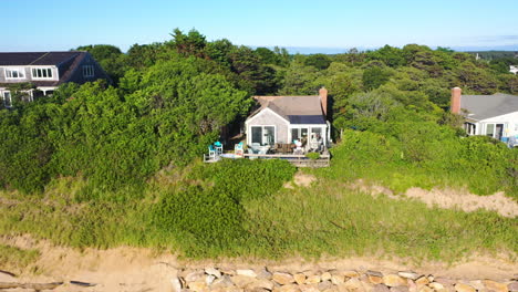 Cape-Cod-Aerial-Drone-Footage-Reveal-of-Marsh-and-Houses-in-Forest-Surrounded-by-Trees