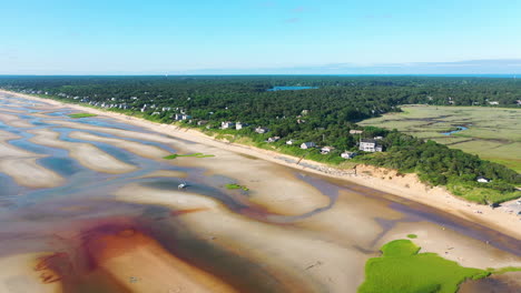 Cape-Cod-Bay-Aerial-Drone-Footage-of-Bay-Side-Beach-at-Low-Tide-and-Beach-Houses-with-Sand-Dunes-and-Marsh