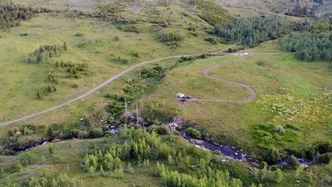 Aerial-view-of-a-camper-van-parked-in-the-Grand-Teton-National-Park