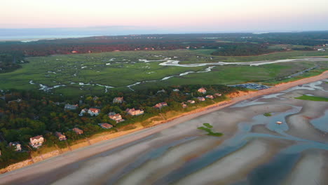 Cape-Cod-Bay-Aerial-Drone-Footage-of-Beach-Front-Houses-and-Marsh-at-Low-Tide-During-Golden-Hour