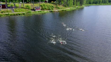 Professional-Swim-Race-in-a-Wild-Lake,-Aerial-Circling