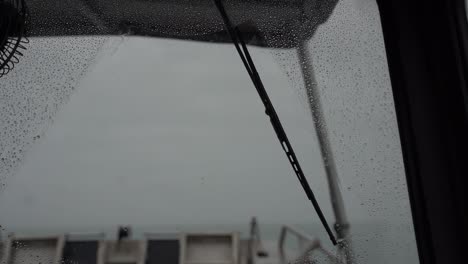 boat-navigating-through-a-strong-storm