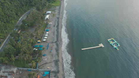 The-Beautiful-and-Expensive-Island-Resort-Composed-Of-Calm-Sea-and-Green-Trees-In-Leyte,-Philippines---Aerial-Drone-Shot-View