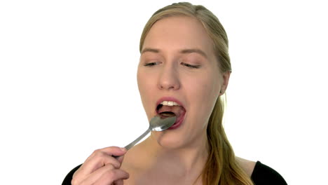 Licking-a-teaspoon