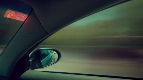 Time-lapse-loop-of-a-car-side-window-and-mirror