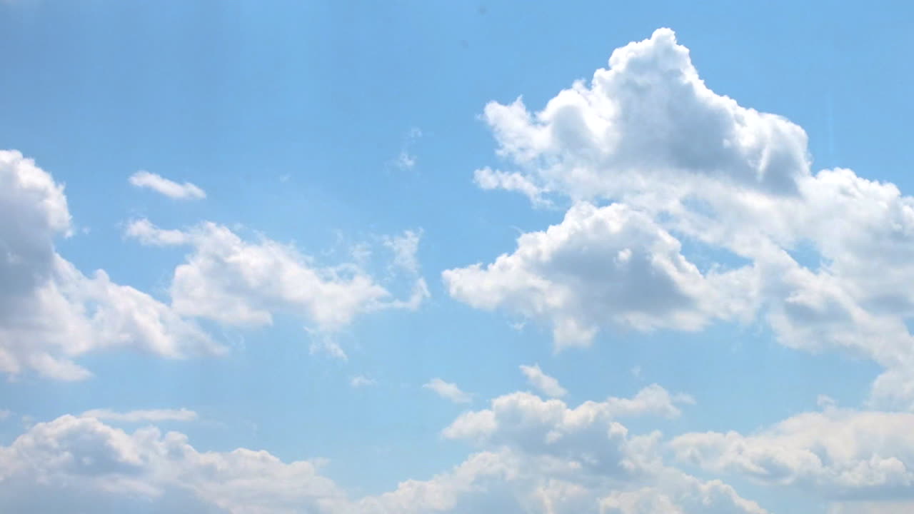 Premium stock video - Time-lapse clouds moving and blue sky