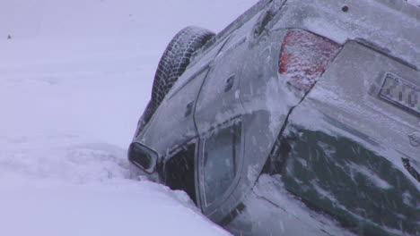 Crashed-Car-Upside-Down-on-the-Roof-After-an-Accident-on-Winter-Road-With-Snow
