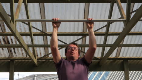 Middle-aged-man-doing-chin-ups