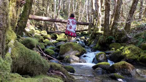 Shaman---Sangoma-at-waterfall-doing-water-ceremony-in-the-Olympic-National-Forest,-Washington-State