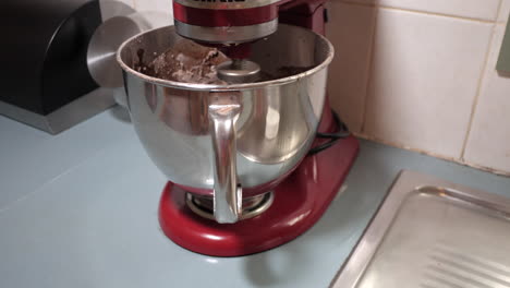Male-preparing-a-chocolate-cake