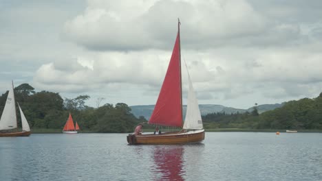 Incredible-handmade-wooden-clinker-built-Mermaid-sailboat-on-lake