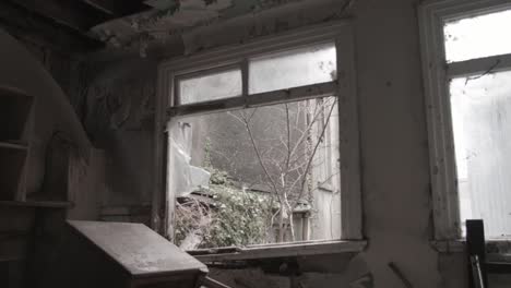 Abandoned-rundown-room-wind-blowing-through-windows
