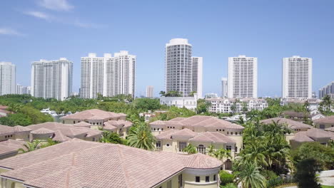 Aerial-Shot-of-Aventura-Florida-Marina,-Revealing-Beautiful-Luxury-Condos,-Yachts-and-Homes-02