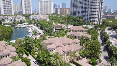 Aerial-Shot-of-Aventura-Florida-Marina,-Circling-Over-Beautiful-Luxury-Condos,-Yachts-and-Homes