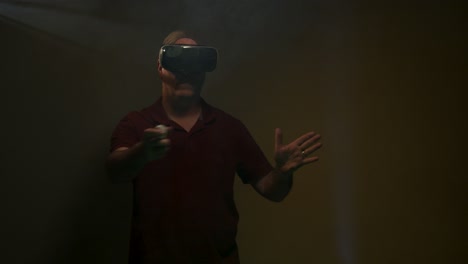 Man-plays-game-while-wearing-VR-headset,-Virtual-Reality-headset