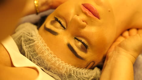 Beautiful-girl-getting-neck-massage-in-beauty-salon