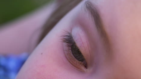 Close-up-of-a-little-girl's-blue-eye