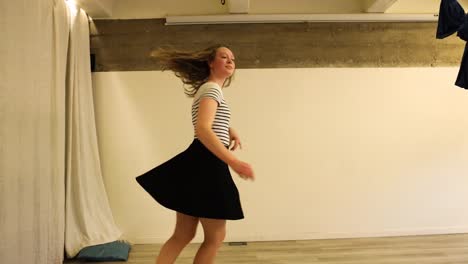Teenage-female-dancer-spinning-around