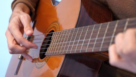 Close-up-of-hands-playing-guitar