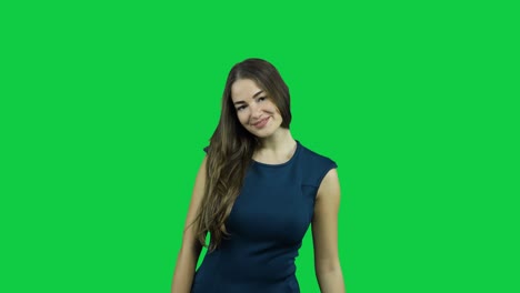 Happy-smiling-girl-in-front-of-a-green-screen