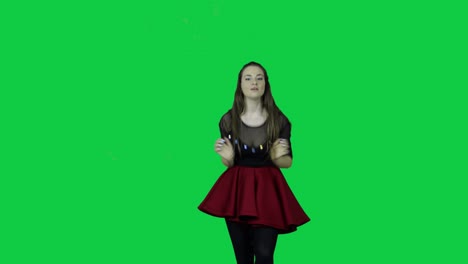 Close-up-to-professional-dancer-energizing-dancing-in-front-of-a-green-screen