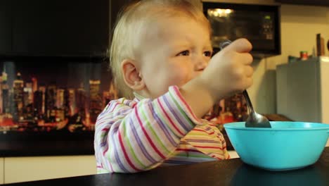 Close-up-little-girl-eating-soup