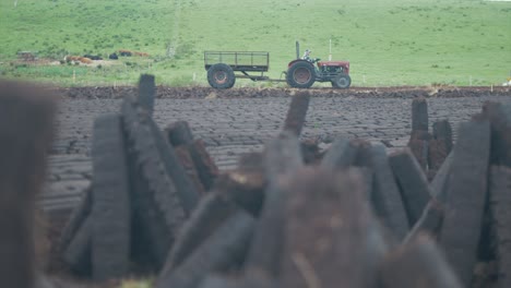 Peat-stacked-drying-on-bog-in-Ireland