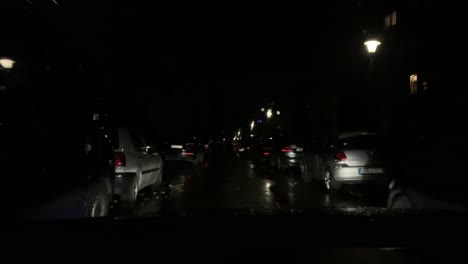 Pov,-from-car-windshield-wipper-drives,during-rainy-day-at-night